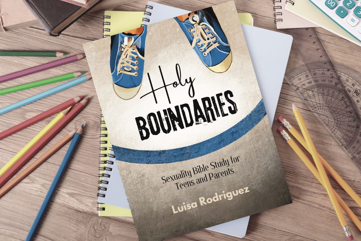 Book "Holy Boundaries: Sexuality Bible Study for Teens and Parents" on messy desk